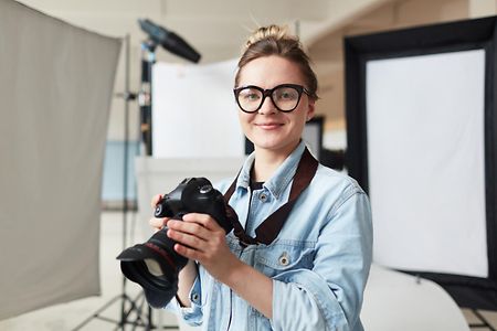 Woman with photocamera