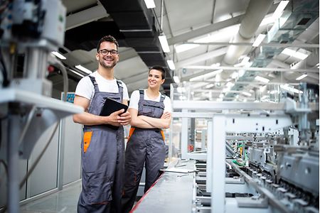 Portrait,Of,Production,Line,Workers,Controlling,Manufacturing,Process,Of,Modern