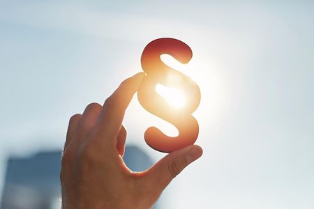 Hand,Holds,Paragraph,Symbol,In,The,Sun,In,The,Sky