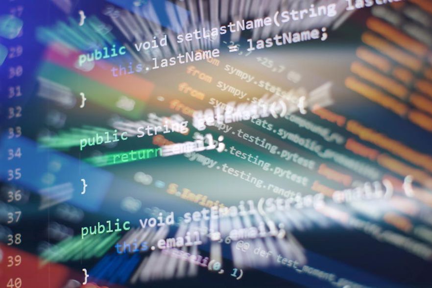 Monitor closeup of function source code. Abstract IT technology background.