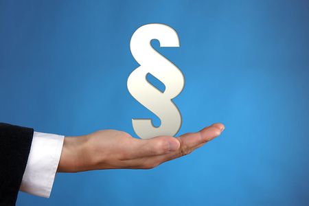 Paragraphen-Zeichen steht auf einer Handfl&auml;che