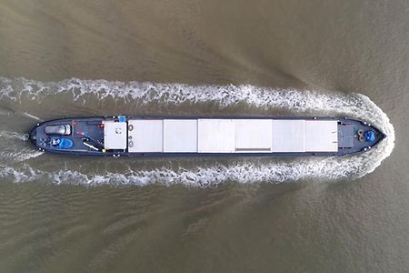 Aerial,Top,Down,Photo,Of,Barge,Moving,Over,Water,This