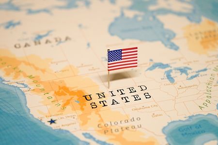 The,Flag,Of,United,States,On,The,World,Map.