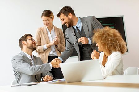 Group of multiethnic young business people working together in the office