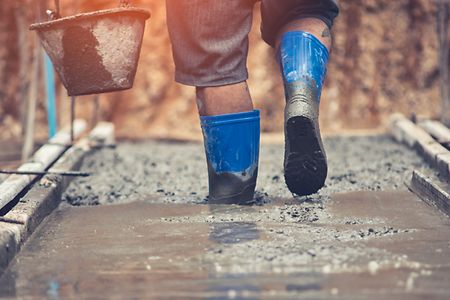 Workers,Are,Walking,On,Concrete,That,Is,Still,Liquid,Under