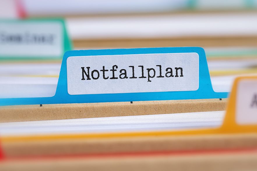 Akten mit der Beschriftung Notfallplan