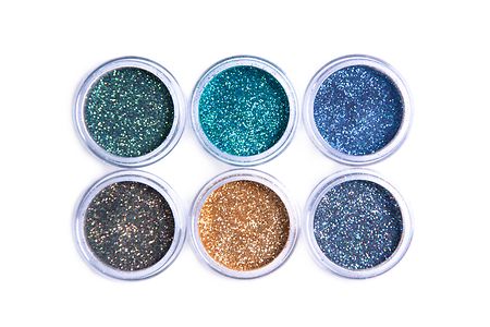 Bright cosmetic glitters in transparent jars