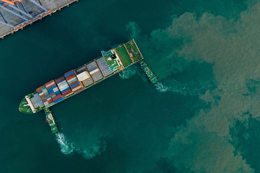 Tug,Boat,Pulling,Cargo,Container,Ship,Into,Cargo,International,Sea