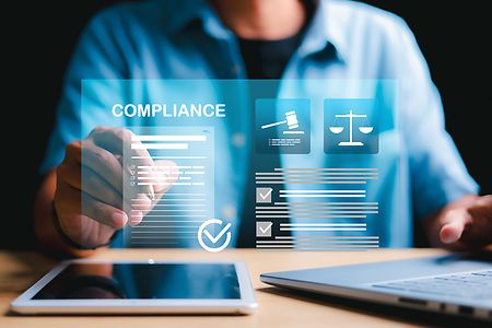 compliance-tablet-hand