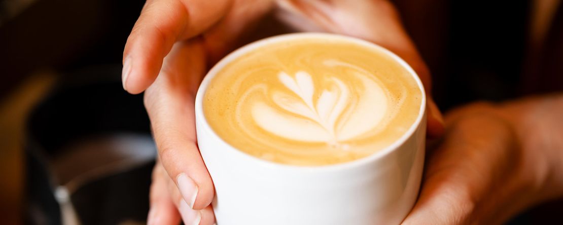 Kaffeetasse mit Milchschaumuster